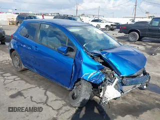 2015 Toyota Yaris L with VIN VNKJTUD3XFA020368, listed as a IAAI auction lot 41555073 with 122,552 mi miles. Bid and sale history available at carsss.com. Image 1.