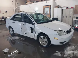 2007 Ford Focus S z VIN 1FAHP34N87W160405, wystawiony jako IAAI lot #41571009 z przebiegiem 122 168 mil mil oraz . Historia ofert i sprzedaży dostępna na DreamBid. Obrazek 1.