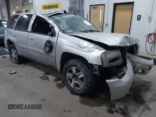 2005 Chevrolet TrailBlazer LT with VIN 1GNDT13SX52357796, listed as a IAAI auction lot 41510963 with 218,766 mi miles and . Bid and sale history available at DreamBid. Image 1.