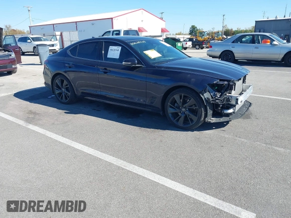 2023 Genesis G70 2.0T z VIN KMTG34TA7PU111215, wystawiony jako IAAI lot #40628348 z przebiegiem 25 146 mil mil oraz . Historia ofert i sprzedaży dostępna na DreamBid. Obrazek 1.