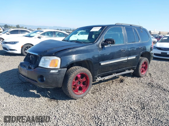 2002 GMC Envoy SLT z VIN 1GKDT13S522146661, wystawiony jako IAAI lot #40502587 z przebiegiem 274 877 mil mil oraz . Historia ofert i sprzedaży dostępna na DreamBid. Obrazek 2.