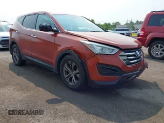 2014 Hyundai Santa Fe z VIN 5XYZTDLB0EG208769, wystawiony jako IAAI lot #42485411 z przebiegiem 82 173 mil mil oraz . Historia ofert i sprzedaży dostępna na DreamBid. Obrazek 1.