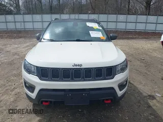 2019 Jeep Compass Trailhawk with VIN 3C4NJDDB0KT733175, listed as a IAAI auction lot 41724527 with 82,574 mi miles and . Bid and sale history available at carsss.com. Image 13.