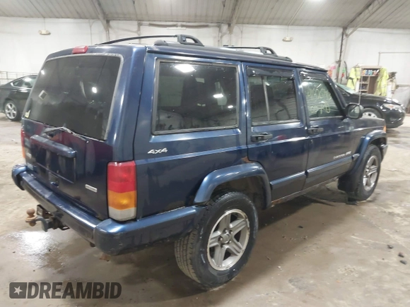 2000 Jeep Cherokee Classic with VIN 1J4FF58SXYL142372, listed as a IAAI auction lot 41820743 with 131,526 mi miles. Bid and sale history available at carsss.com. Image 4.