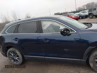 2021 Mazda CX-9 Touring z VIN JM3TCBCY4M0520362, wystawiony jako IAAI lot #41193396 z przebiegiem 17 323 mil mil oraz . Historia ofert i sprzedaży dostępna na DreamBid. Obrazek 13.