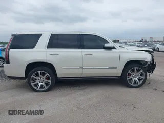 2015 Cadillac Escalade Premium z VIN 1GYS4CKJ4FR216873, wystawiony jako IAAI lot #41677234 z przebiegiem 128 990 mil mil oraz . Historia ofert i sprzedaży dostępna na DreamBid. Obrazek 13.