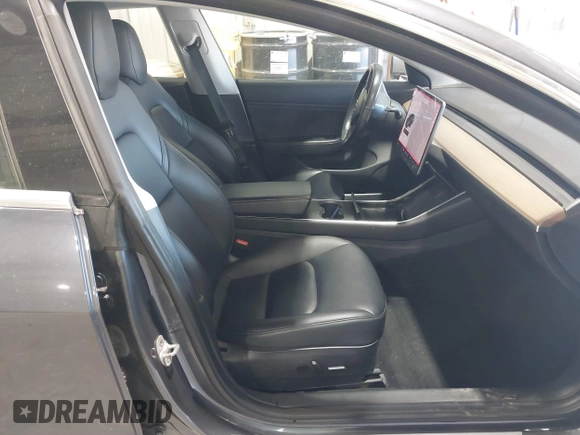 2018 Tesla Model 3 Long Range Battery with VIN 5YJ3E1EB1JF145520, listed as a IAAI auction lot 41360939 with 95,010 mi miles and . Bid and sale history available at DreamBid. Image 5.