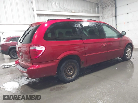 2002 Dodge Grand Caravan with VIN 2B4GT44L42R567657, listed as a IAAI auction lot 41109666 with 178,301 mi miles and . Bid and sale history available at DreamBid. Image 4.