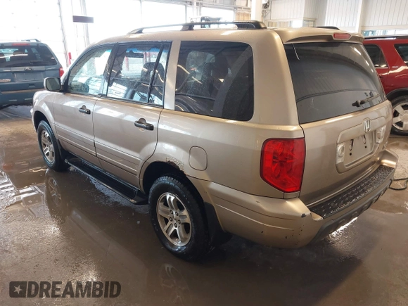 2005 Honda Pilot EX-L with VIN 2HKYF18595H542103, listed as a IAAI auction lot 41472326 with 269,844 mi miles. Bid and sale history available at carsss.com. Image 3.