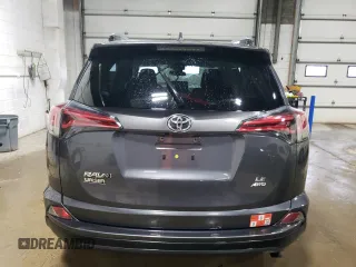 2018 Toyota RAV4 LE with VIN JTMBFREV1JD248395, listed as a Copart auction lot 51752305 with 62,161 mi miles and Salvage Title. Bid and sale history available at DreamBid. Image 6.
