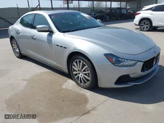 2014 Maserati Ghibli S Q4 with VIN ZAM57RTA8E1085631, listed as a IAAI auction lot 41829745 with 80,418 mi miles. Bid and sale history available at carsss.com. Image 1.