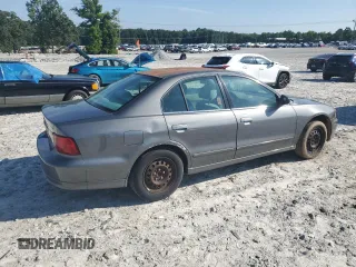 2003 Mitsubishi Galant ES z VIN 4A3AA46G03E042881, wystawiony jako Copart lot #61861195 z przebiegiem 139 049 mil mil oraz Czysty tytuł • Clean title. Historia ofert i sprzedaży dostępna na DreamBid. Obrazek 3.