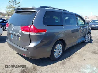 2013 Toyota Sienna XLE with VIN 5TDDK3DC0DS059036, listed as a IAAI auction lot 42069896 with 124,105 mi miles and . Bid and sale history available at DreamBid. Image 4.
