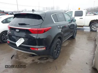 2018 Kia Sportage EX with VIN KNDPNCAC4J7409914, listed as a IAAI auction lot 41654833 with 142,057 mi miles and . Bid and sale history available at carsss.com. Image 4.