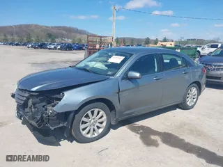 2010 Chrysler Sebring Limited with VIN 1C3CC5FB2AN207816, listed as a IAAI auction lot 41977487 with 130,052 mi miles. Bid and sale history available at carsss.com. Image 2.