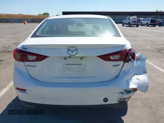 2015 Mazda 3 i Touring with VIN 3MZBM1V77FM236463, listed as a IAAI auction lot 42232927 with 73,040 mi miles and . Bid and sale history available at DreamBid. Image 16.