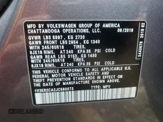 2018 Volkswagen Atlas SE with VIN 1V2KR2CA2JC580073, listed as a Copart auction lot 58898265 with 69,377 mi miles and Salvage title. Bid and sale history available at DreamBid. Image 13.