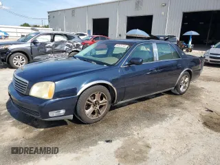 2003 Cadillac DeVille z VIN 1G6KD54Y83U286738, wystawiony jako Copart lot #60525745 z przebiegiem 130 860 mil mil oraz Szkoda całkowita • Salvage title. Historia ofert i sprzedaży dostępna na DreamBid. Obrazek 1.