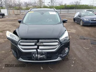 2017 Ford Escape Titanium with VIN 1FMCU0J95HUD37858, listed as a IAAI auction lot 41984629 with 87,163 mi miles and . Bid and sale history available at DreamBid. Image 11.
