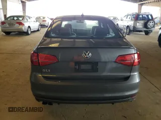 2017 Volkswagen Jetta GLI z VIN 3VW4T7AJ7HM327526, wystawiony jako Copart lot #52936635 z przebiegiem 41 036 mil mil oraz Szkoda całkowita • Salvage title. Historia ofert i sprzedaży dostępna na DreamBid. Obrazek 6.