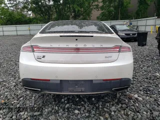2018 Lincoln MKZ с VIN 3LN6L5G9XJR611248, выставлен на аукционе Copart как лот 59836945 с пробегом 62 773 миль миль и Списание • Salvage title. История ставок и продаж доступна на DreamBid. Изображение 6.