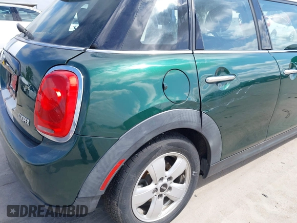 2016 MINI Hardtop 4 Door with VIN WMWXU1C52G2D10035, listed as a IAAI auction lot 42190544 with 106,383 mi miles and . Bid and sale history available at DreamBid. Image 18.
