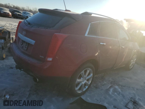 2015 Cadillac SRX Performance Collection with VIN 3GYFNFE39FS556708, listed as a Copart auction lot 41670355 with 177,601 mi miles and Salvage title. Bid and sale history available at DreamBid. Image 3.