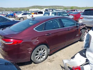 2017 Ford Fusion Titanium with VIN 3FA6P0SU9HR379474, listed as a IAAI auction lot 41979180 with 948,175 mi miles and . Bid and sale history available at DreamBid. Image 4.