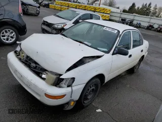 1994 Toyota Corolla with VIN 1NXAE04B2RZ175367, listed as a Copart auction lot 82191804 with 168,836 mi miles and Salvage title. Bid and sale history available at DreamBid. Image 1.