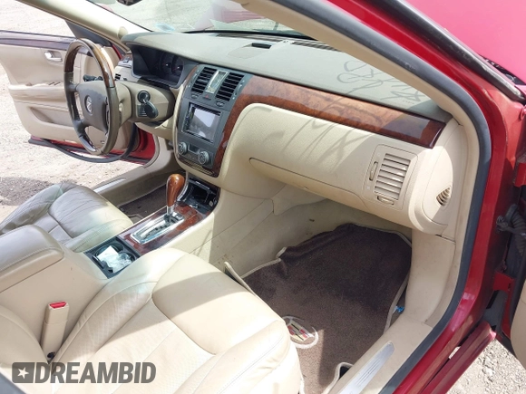 2006 Cadillac DTS w/1SE with VIN 1G6KD57996U113240, listed as a IAAI auction lot 42120004 with 120,806 mi miles. Bid and sale history available at carsss.com. Image 5.