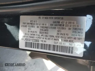 2014 Mazda CX-5 Grand Touring with VIN JM3KE4DY1E0339690, listed as a IAAI auction lot 41668780 with 216,825 mi miles. Bid and sale history available at carsss.com. Image 9.