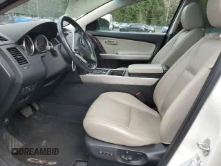 2014 Mazda CX-9 Grand Touring with VIN JM3TB3DV0E0437557, listed as a Copart auction lot 46899435 with 98,525 mi miles and Clean Title. Bid and sale history available at DreamBid. Image 7.