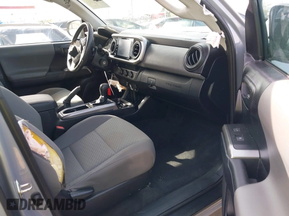 2020 Toyota Tacoma SR5 with VIN 5TFAZ5CN6LX089275, listed as a IAAI auction lot 41987526 with 51,661 mi miles and . Bid and sale history available at DreamBid. Image 5.