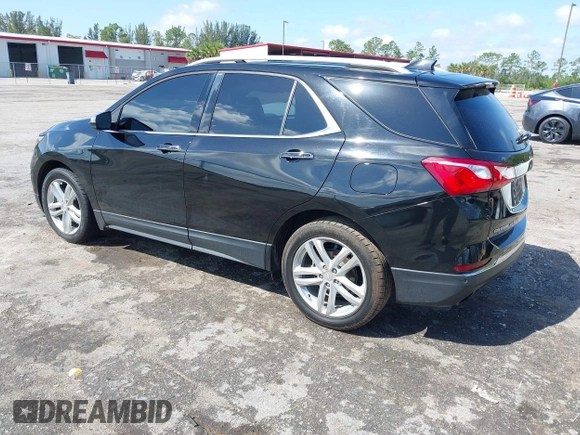 2018 Chevrolet Equinox Premier with VIN 2GNAXNEX1J6313528, listed as a IAAI auction lot 41938985 with 189,244 mi miles and . Bid and sale history available at DreamBid. Image 3.