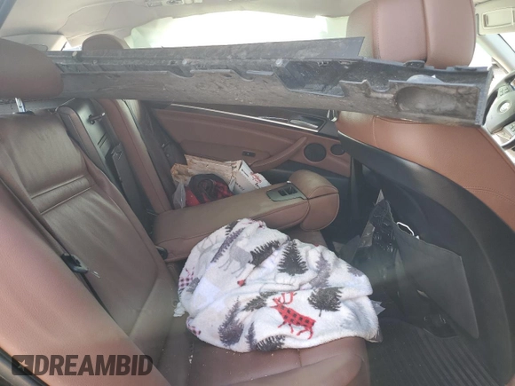 2012 BMW X5 35i with VIN 5UXZV4C54CL985119, listed as a Copart auction lot 56856735 with Not provided miles and Salvage title. Bid and sale history available at DreamBid. Image 11.