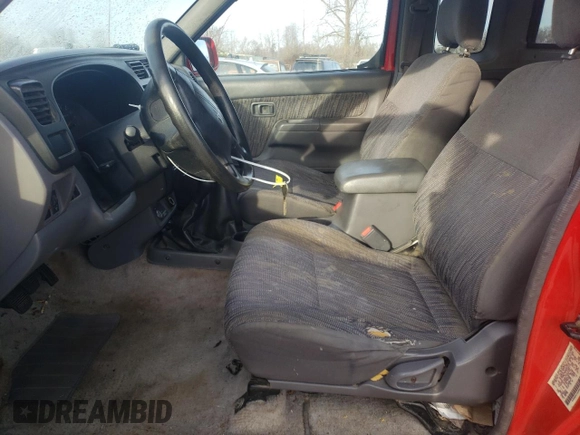 1999 Nissan Frontier XE with VIN 1N6ED26Y2XC312863, listed as a Copart auction lot 42259015 with 212,666 mi miles and Salvage title. Bid and sale history available at DreamBid. Image 7.