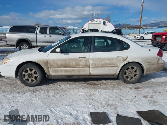 2003 Ford Taurus SES Standard with VIN 1FAFP55U53A207874, listed as a IAAI auction lot 41414690 with 194,620 mi miles. Bid and sale history available at carsss.com. Image 14.
