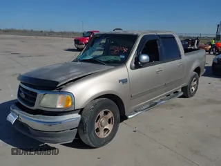 2002 Ford F-150 XLT with VIN 1FTRW07672KB31448, listed as a IAAI auction lot 41226836 with 265,234 mi miles. Bid and sale history available at carsss.com. Image 2.
