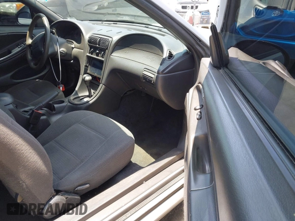1999 Ford Mustang with VIN 1FAFP4046XF202967, listed as a IAAI auction lot 42574831 with 138,068 mi miles and . Bid and sale history available at DreamBid. Image 5.