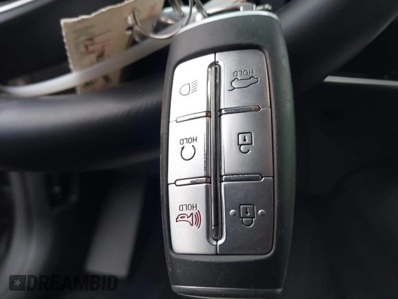 2022 Genesis GV70 2.5T with VIN KMUMADTB2NU059678, listed as a IAAI auction lot 41479833 with 30,598 mi miles and . Bid and sale history available at DreamBid. Image 11.