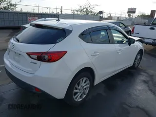 2015 Mazda 3 i Sport with VIN JM1BM1K78F1242096, listed as a IAAI auction lot 41447819 with 91,738 mi miles and . Bid and sale history available at DreamBid. Image 4.
