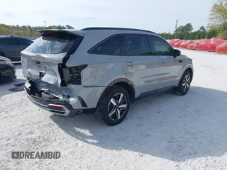 2023 Kia Sorento EX z VIN 5XYRH4LF9PG229689, wystawiony jako IAAI lot #41893442 z przebiegiem 17 906 mil mil oraz . Historia ofert i sprzedaży dostępna na DreamBid. Obrazek 4.