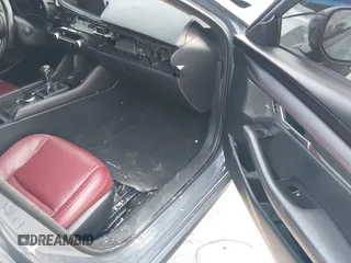 2022 Mazda 3 Carbon Edition z VIN JM1BPACL2N1509492, wystawiony jako IAAI lot #41198183 z przebiegiem Nie podano mil oraz . Historia ofert i sprzedaży dostępna na DreamBid. Obrazek 5.