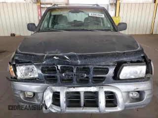 2001 Isuzu Rodeo S with VIN 4S2CK58W614344850, listed as a Copart auction lot 63807664 with 176,203 mi miles and Salvage title. Bid and sale history available at DreamBid. Image 5.