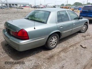2005 Mercury Grand Marquis LS Premium z VIN 2MHHM75W95X607697, wystawiony jako IAAI lot #42453303 z przebiegiem 142 879 mil mil oraz . Historia ofert i sprzedaży dostępna na DreamBid. Obrazek 4.