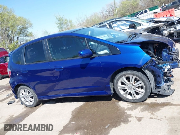 2010 Honda Fit Sport with VIN JHMGE8H4XAS018807, listed as a IAAI auction lot 41990369 with 63,151 mi miles. Bid and sale history available at carsss.com. Image 14.