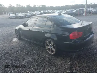 2011 BMW 3 Series 335i with VIN WBAPM5C57BE435169, listed as a IAAI auction lot 41940172 with 136,346 mi miles. Bid and sale history available at carsss.com. Image 3.
