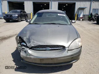 2001 Ford Taurus SES with VIN 1FAFP55U71A232899, listed as a Copart auction lot 53276665 with 129,347 mi miles and Salvage Title. Bid and sale history available at carsss.com. Image 5.