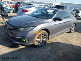 2020 Honda Civic Coupe EX with VIN 2HGFC3B32LH350628, listed as a IAAI auction lot 41215957 with 71,985 mi miles. Bid and sale history available at carsss.com. Image 2.