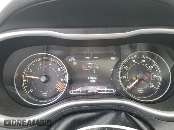 2014 Jeep Cherokee Trailhawk with VIN 1C4PJMBB9EW124371, listed as a Copart auction lot 42038105 with 137,717 mi miles and Salvage Title. Bid and sale history available at carsss.com. Image 9.